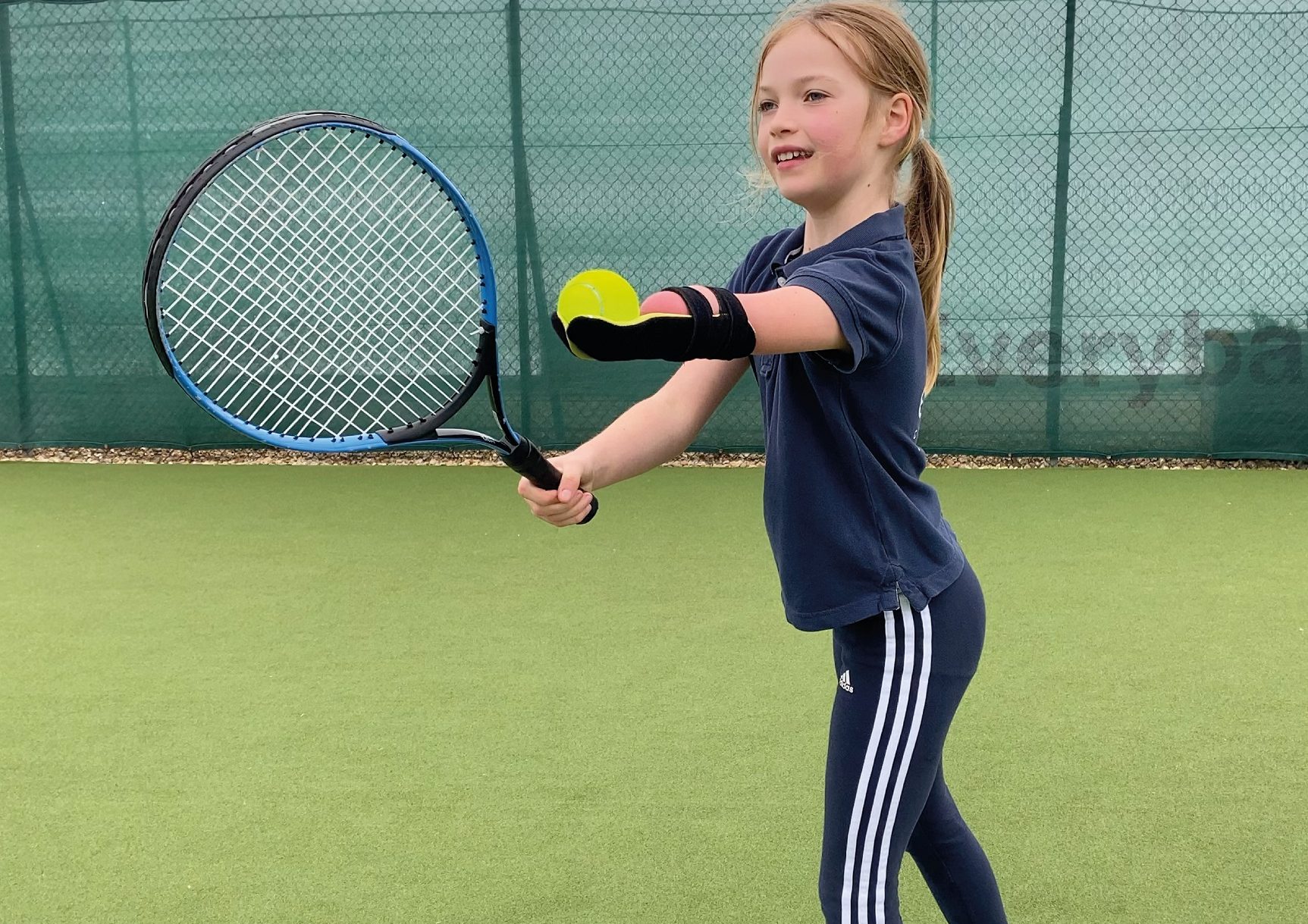 9-Year-Old Tennis Star Triumphs With New Prosthetic Arm